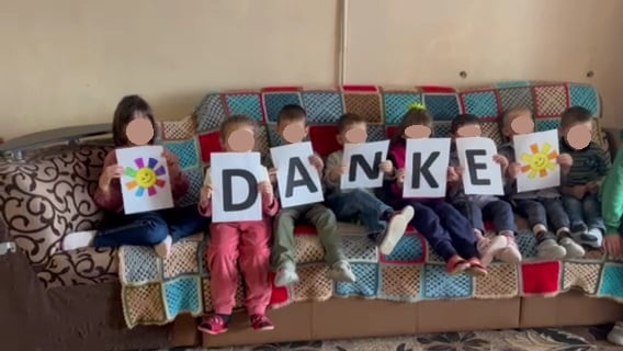 Children thanking volunteers