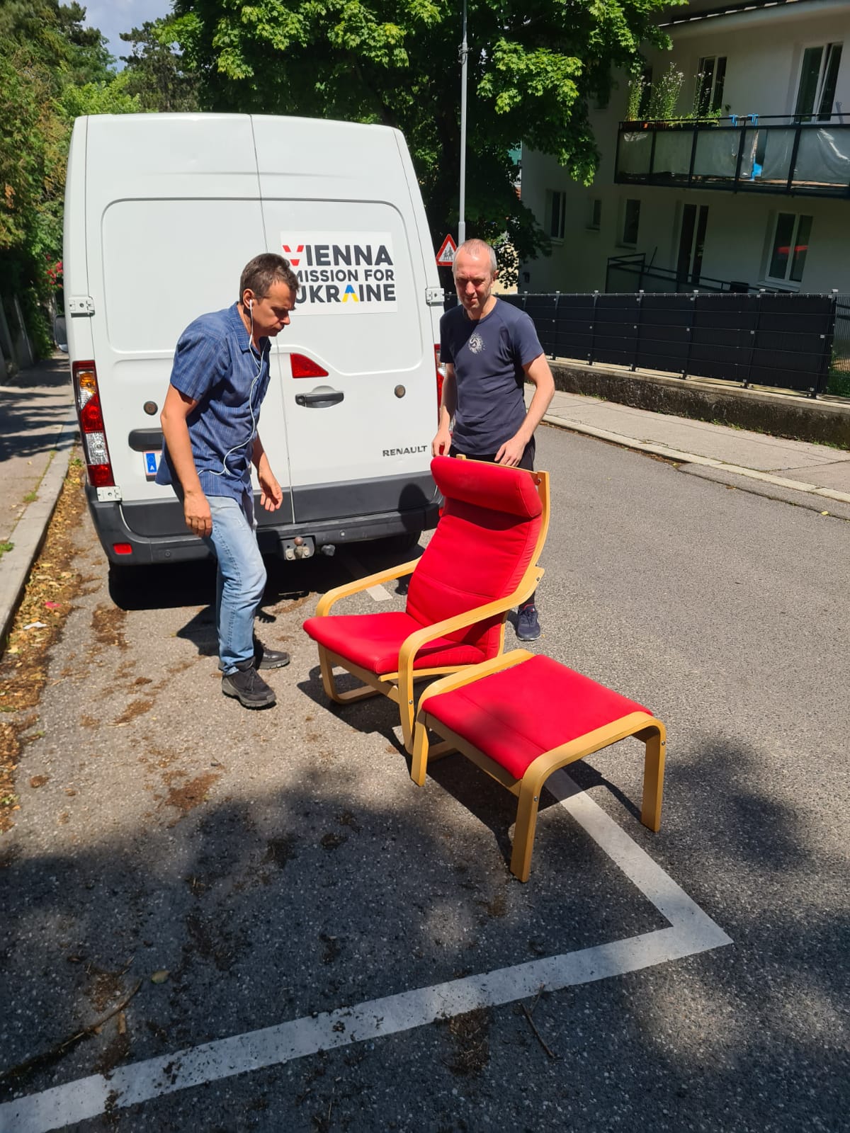 Arkady and Anatoli never stop delivering donated furniture to refugees